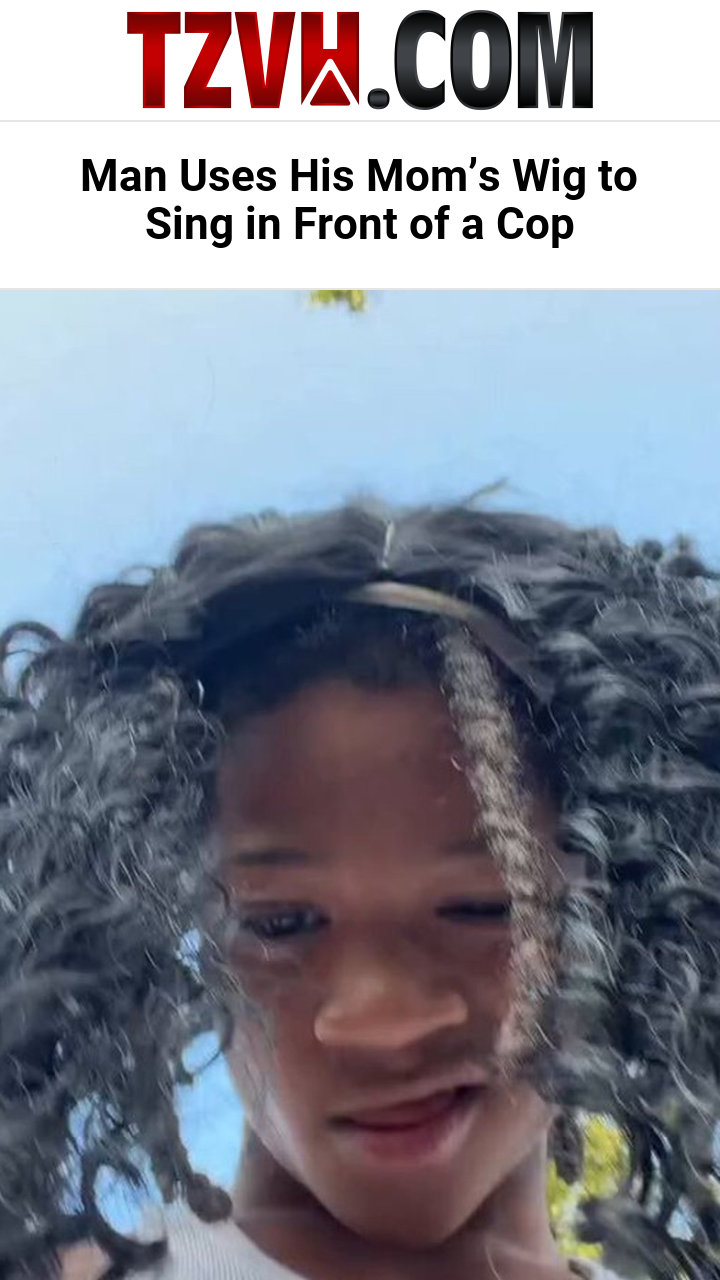 Man Uses His Mom’s Wig to Sing in Front of a Cop