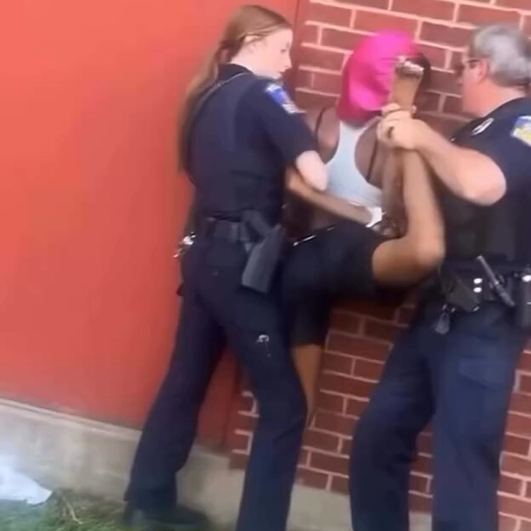 Footage Shows Woman Arrested by Two Officers in Unusual Restraint