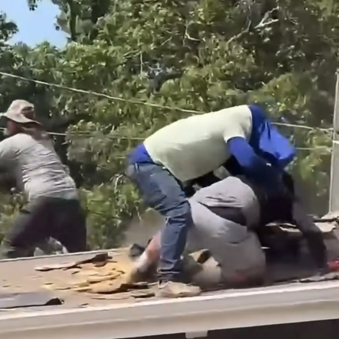 Chaotic Rooftop Brawl Breaks Out Among Migrant Workers