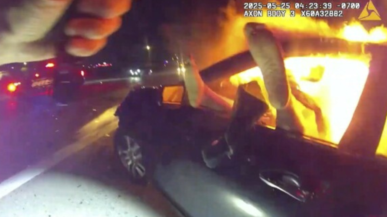 Bodycam Shows Police Officer Pulling Woman From Burning Car